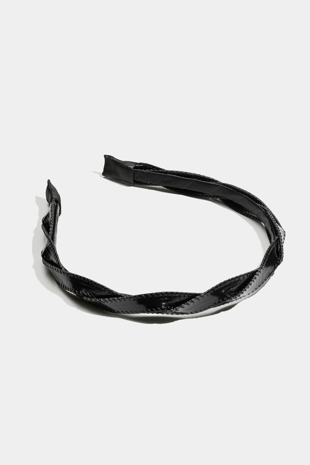 Sort hårbøyle med tvunnet bånd