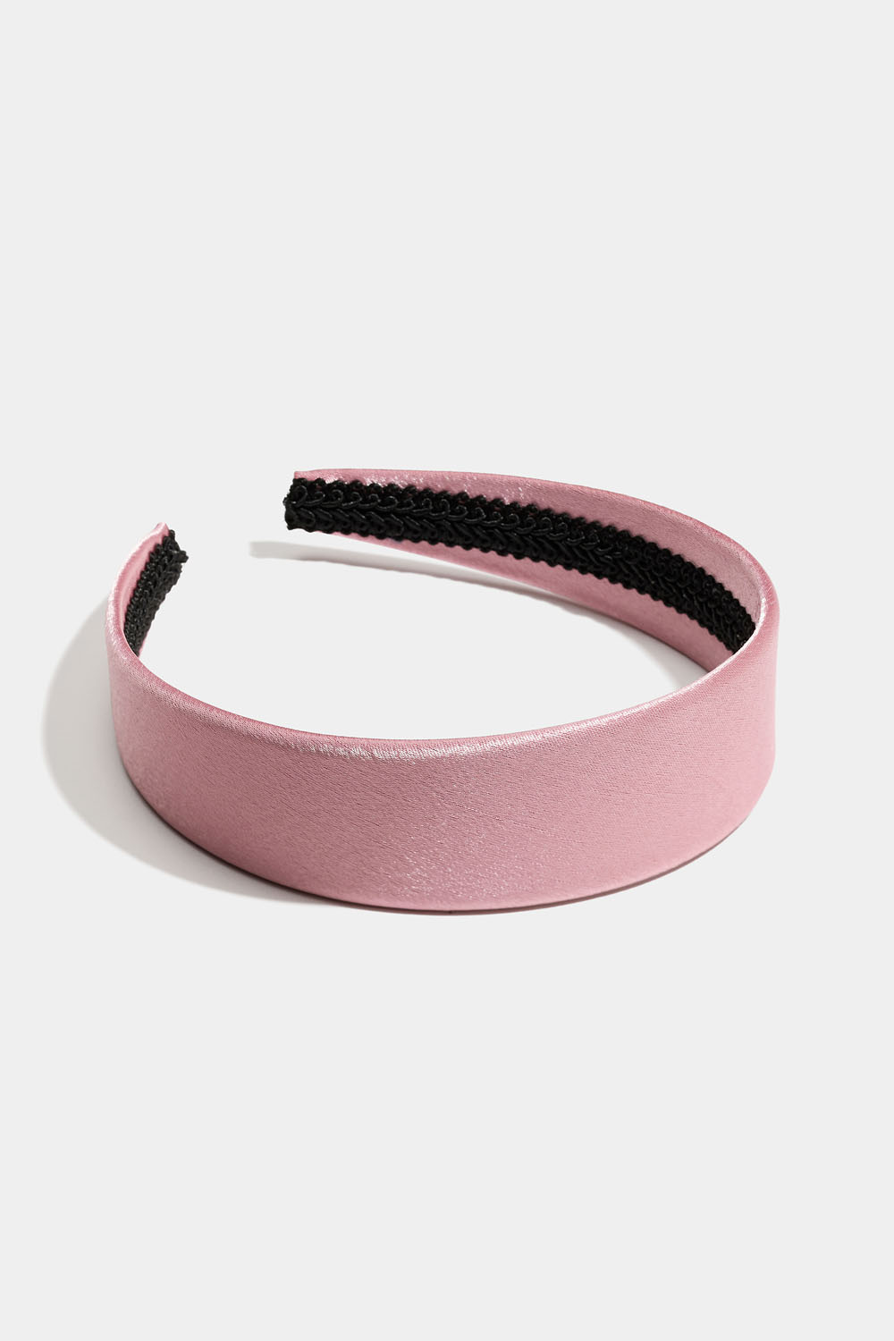 Rosa hårbøyle i glansfullt stoff