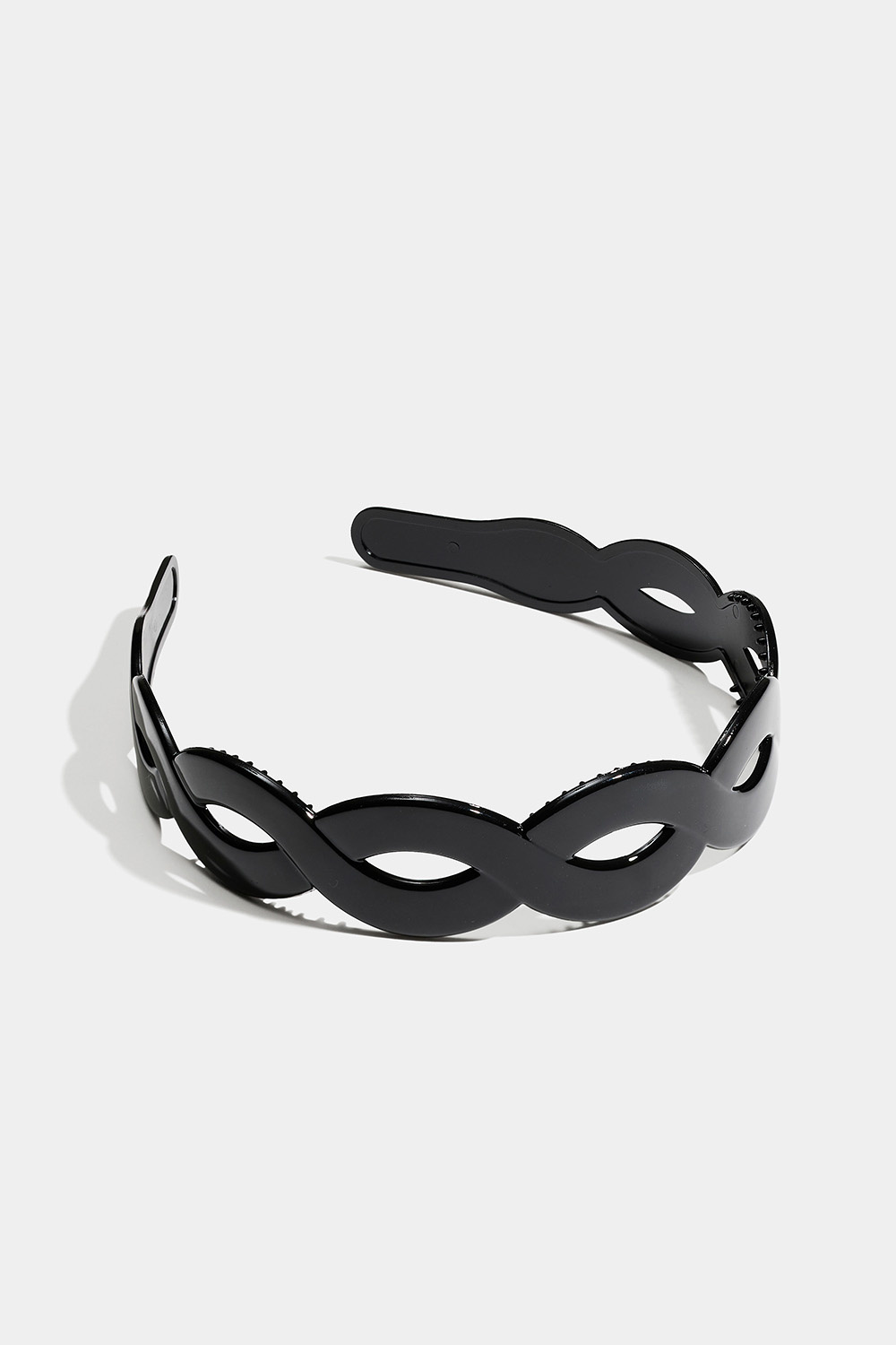 Bred svart, tvunnet hårbøyle