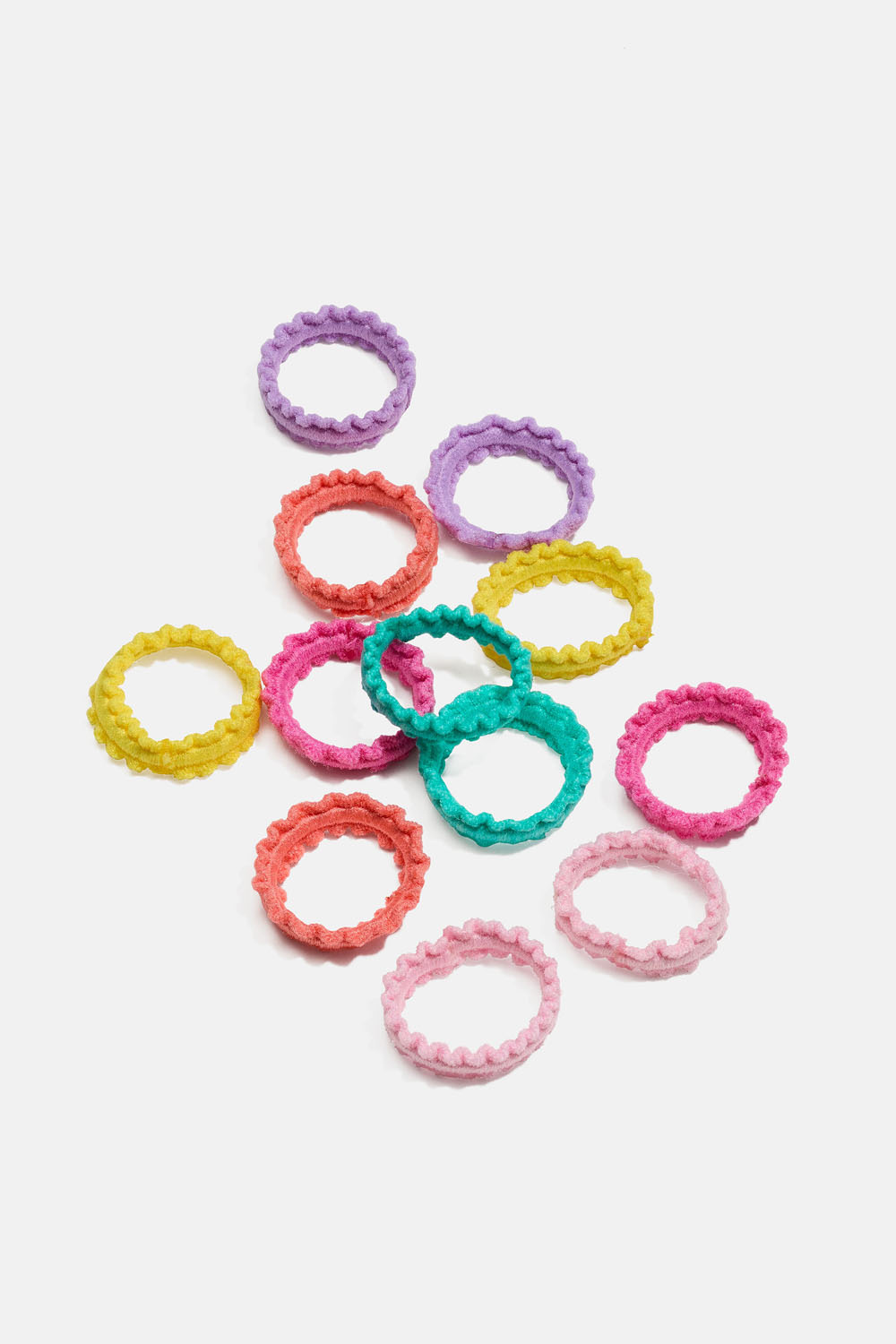 Mini hårstrikker i assorterte farger, 12-pakning