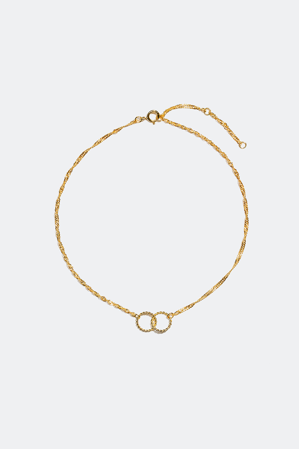 Tvinnet sølvfotlenke med to ringer