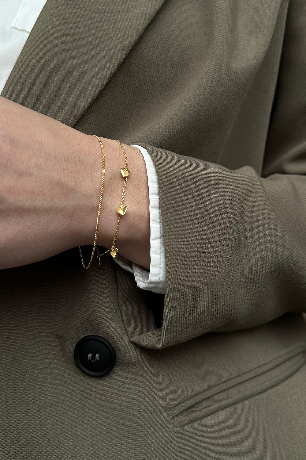 Armbånd i 18k forgylt ekte sølv med små hjerter 