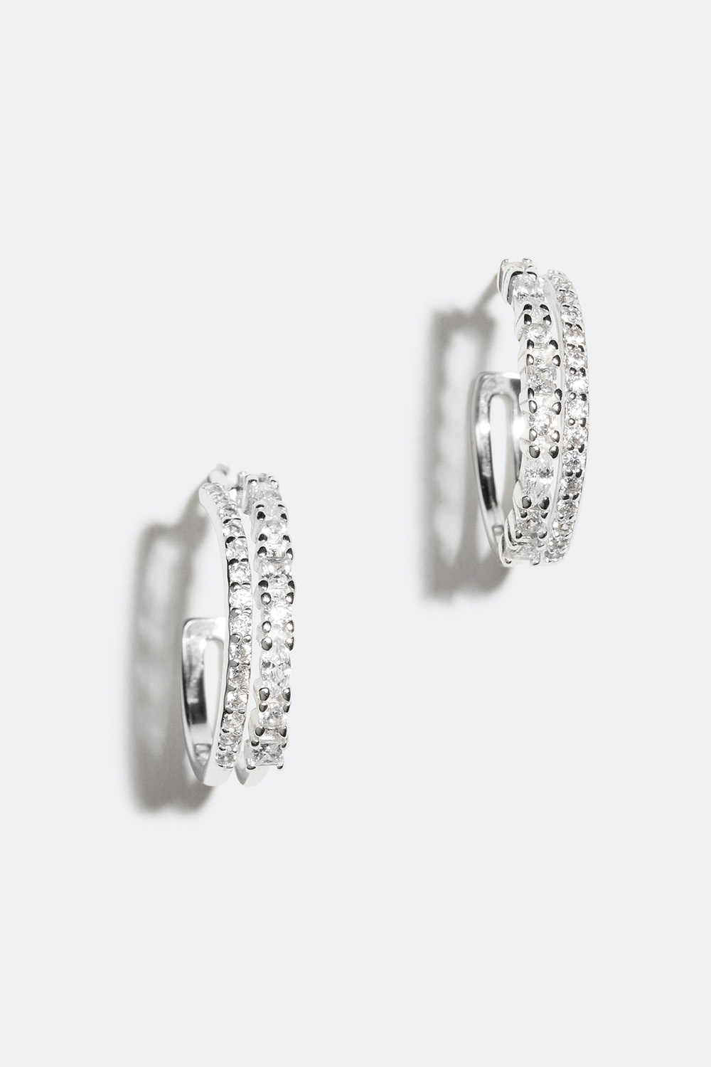 Doble øreringer i ekte sølv med zirkonia.