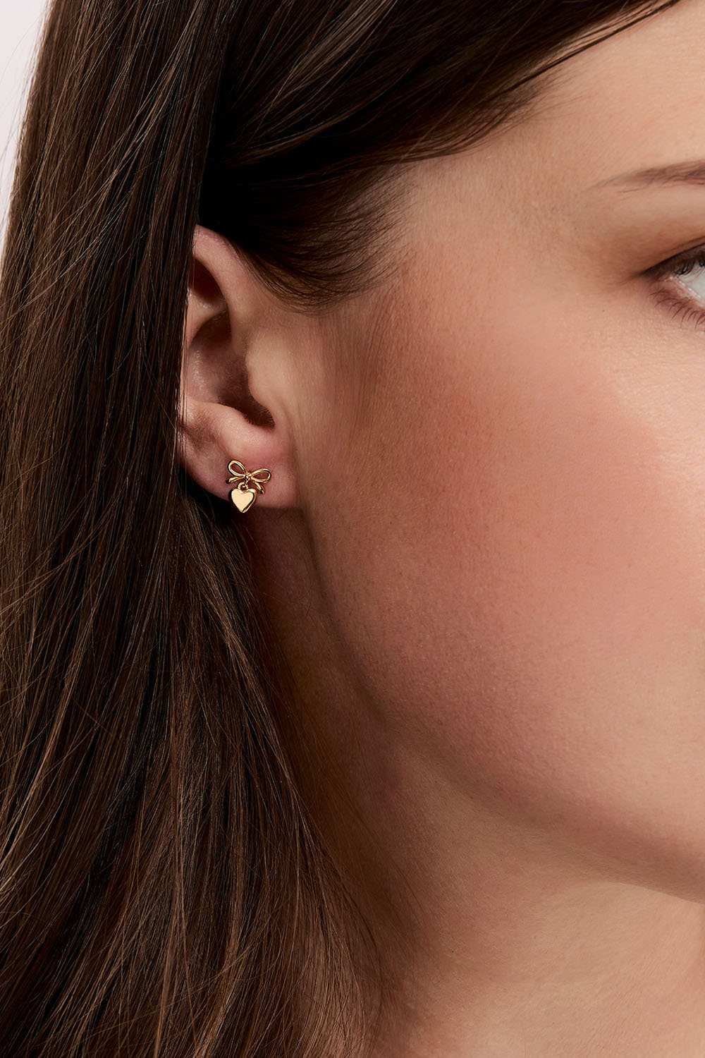 Øredobber i ekte sølv med 18 karat gullplett, med sløyfe og hjerte