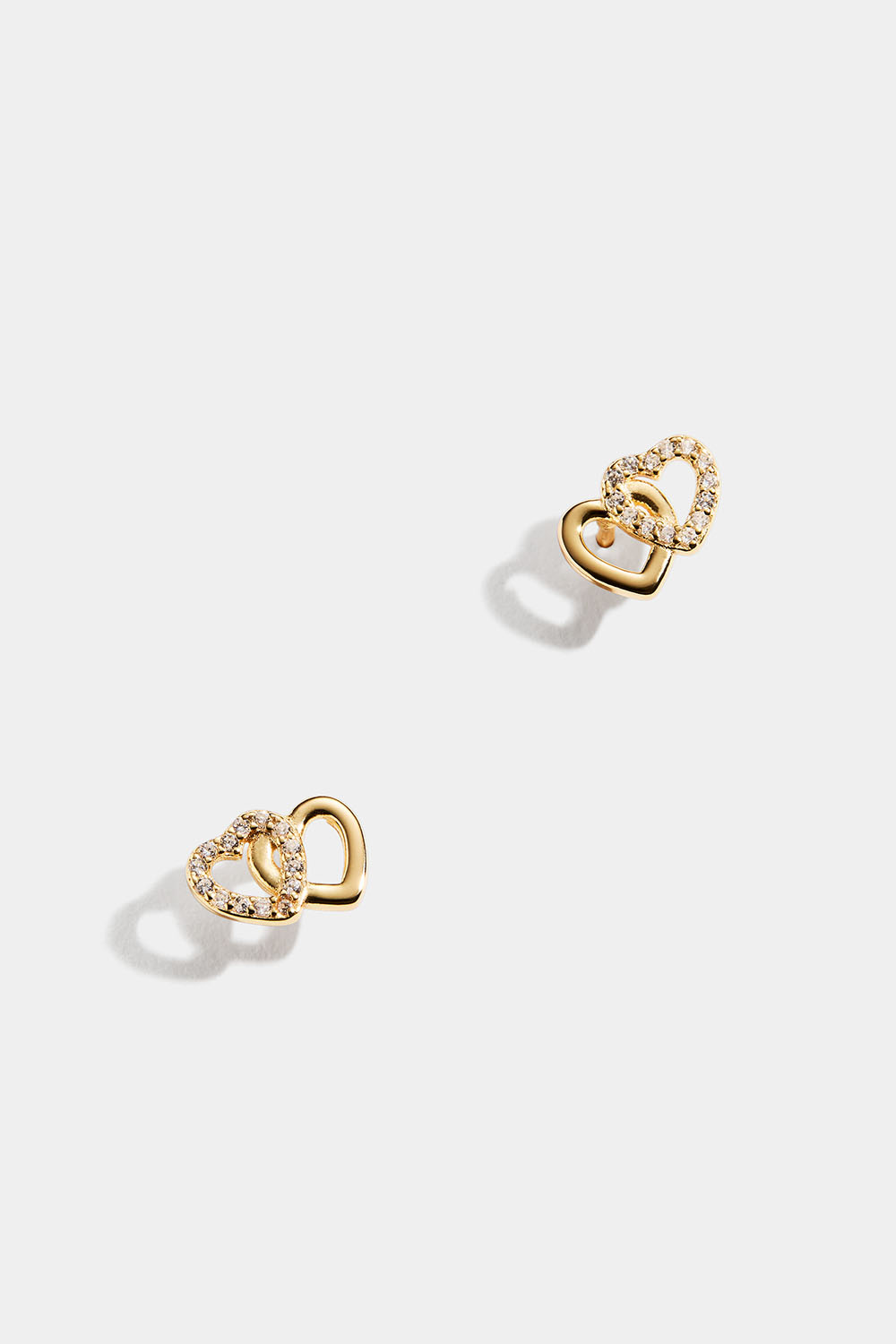 Øredobber i 18k forgylt ekte sølv med to hjerter og Cubic Zirconia