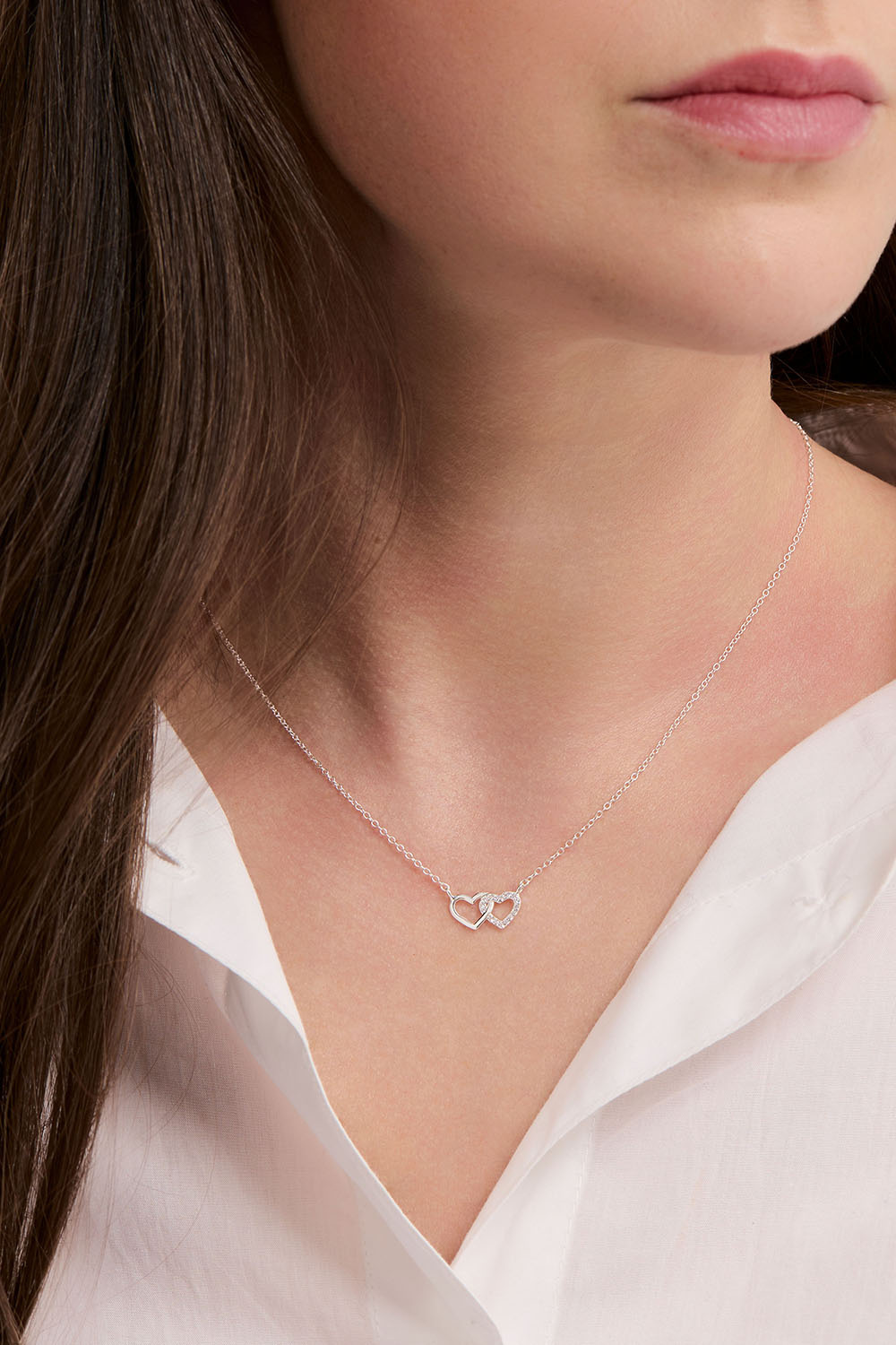 Halskjede i ekte sølv med to hjerter
