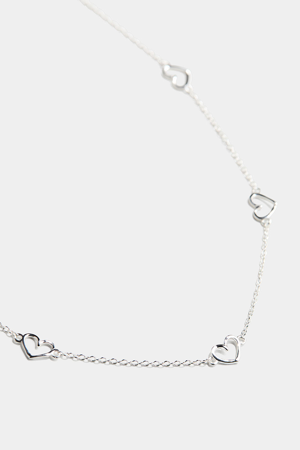 Halskjede i ekte sølv med fem hjerter