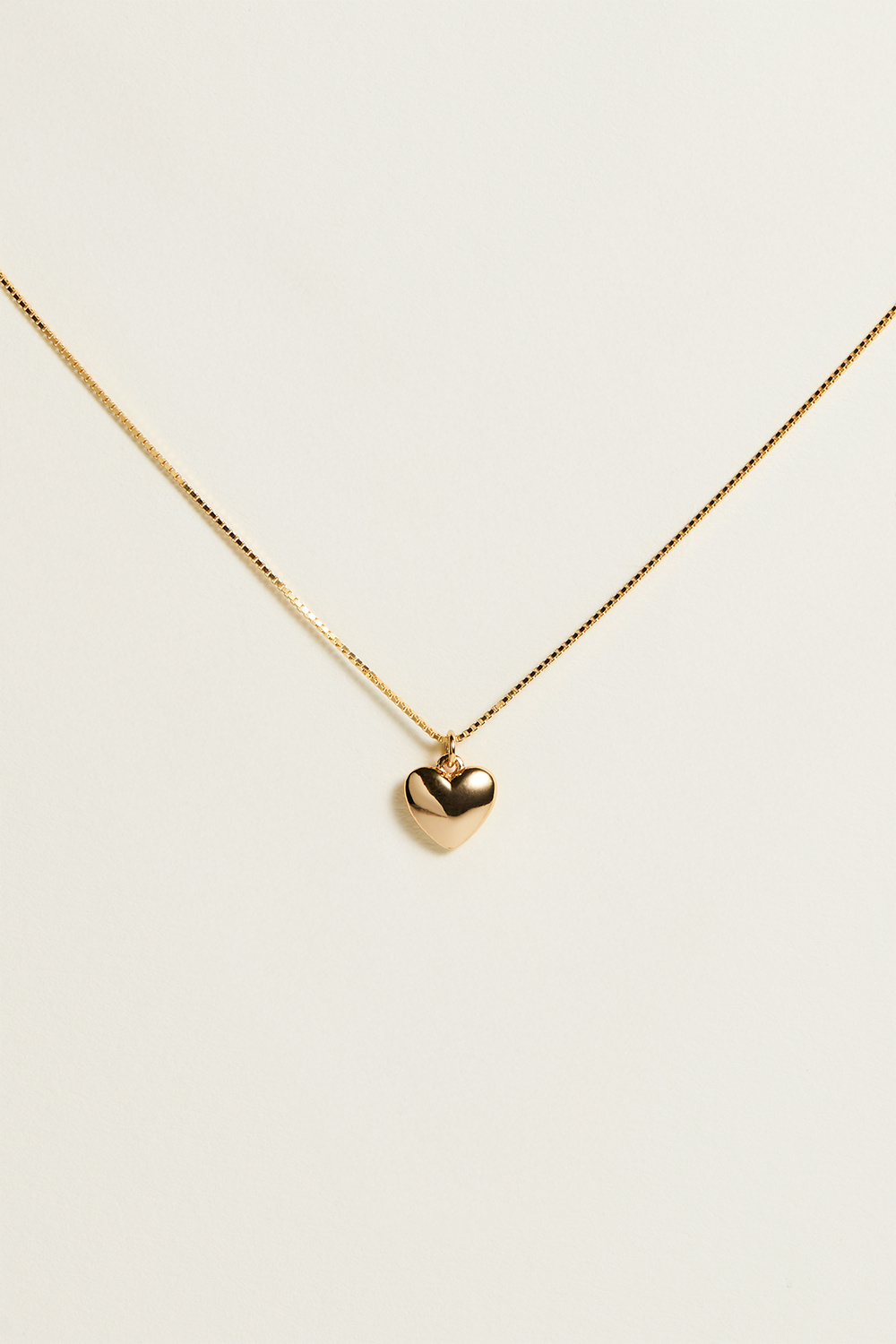 Halskjede i 18k forgylt ekte sølv med fylt hjerte